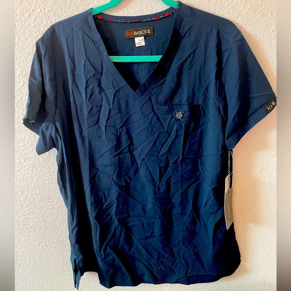 Koi Basics Navy Blue one-pocket/tuck-in scrub top. NWT